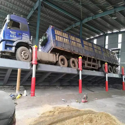 Enclosed Hydraulic Truck Unloader With Side And Backward Flipping For Efficient Cargo Handling